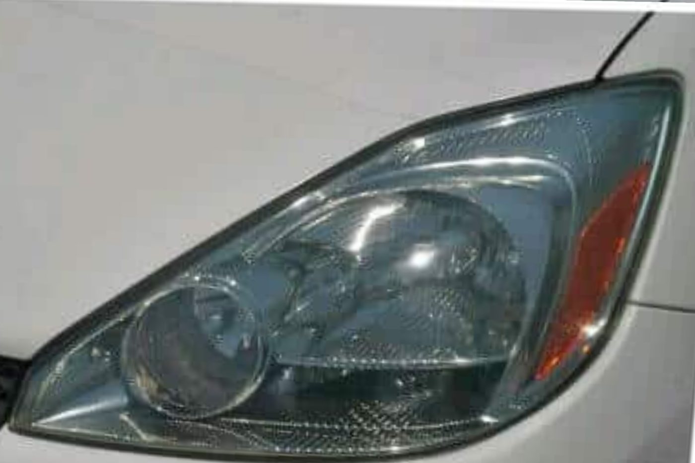 A headlight restored to a clear finish