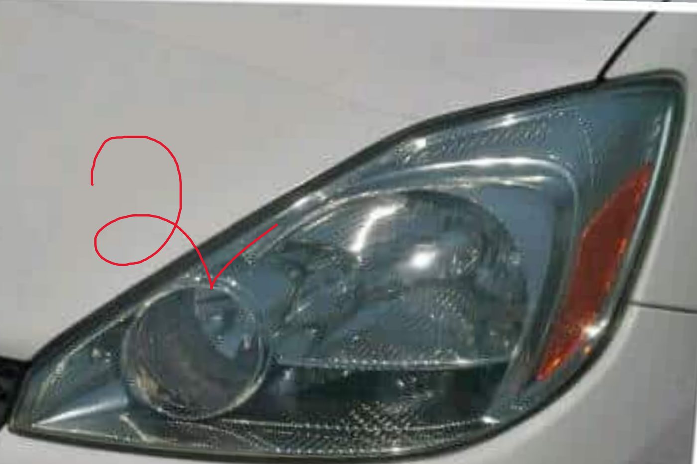 A clear, white-output headlight after restoration