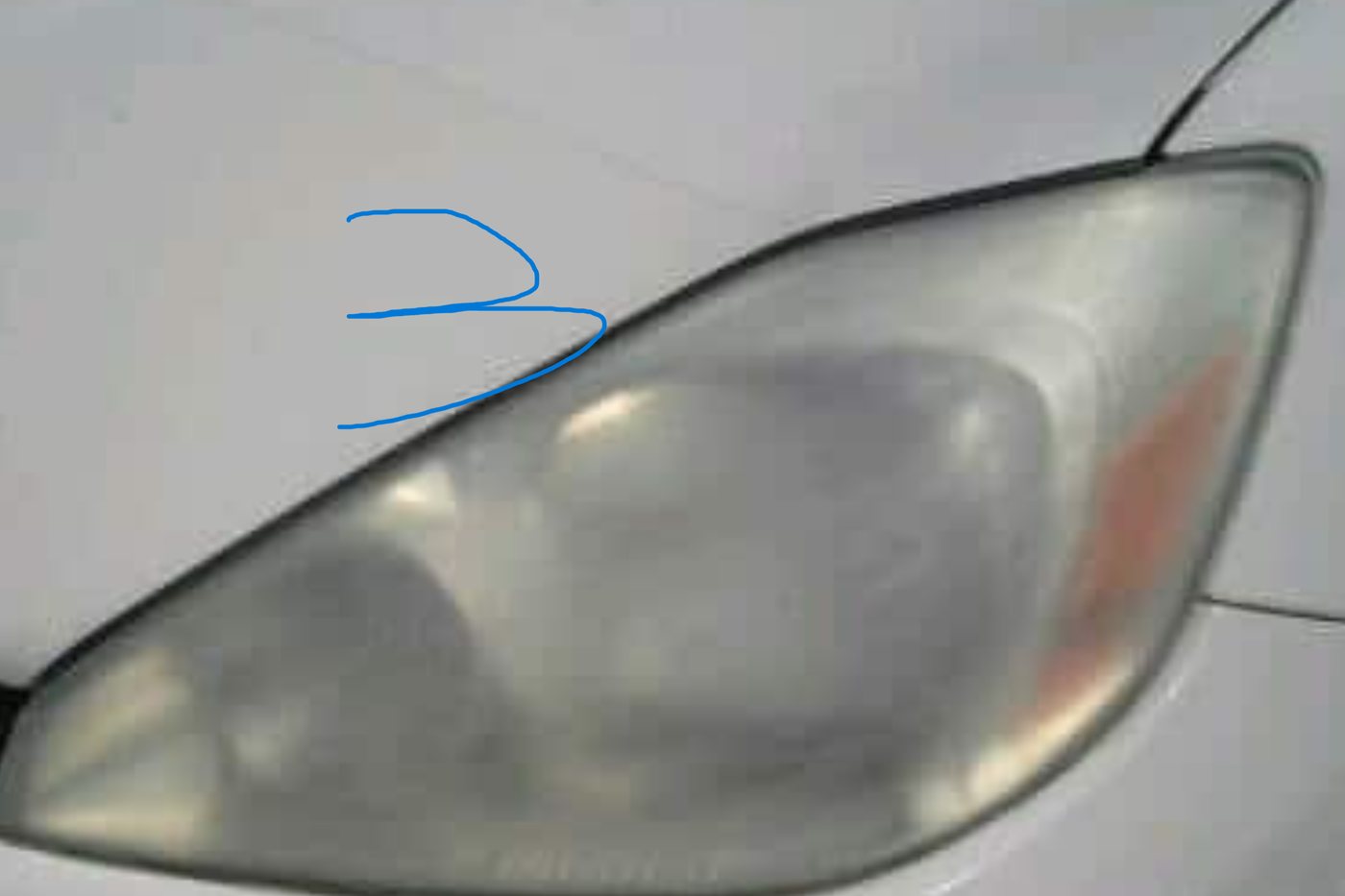 Headlight before restoration: cloudy and dim